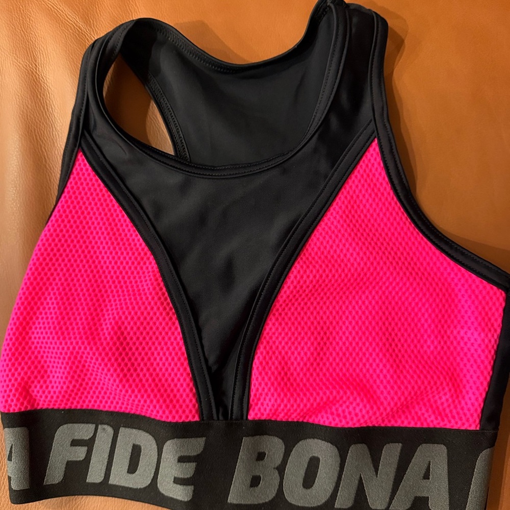 Champion Pink and Black High-Impact Sports brand is Bona Fide